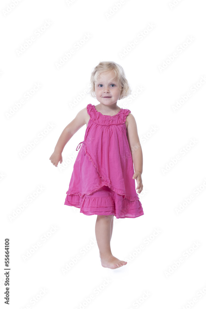 running little girl in pink dress, isolated on white running little girl in pink dress, isolated on white