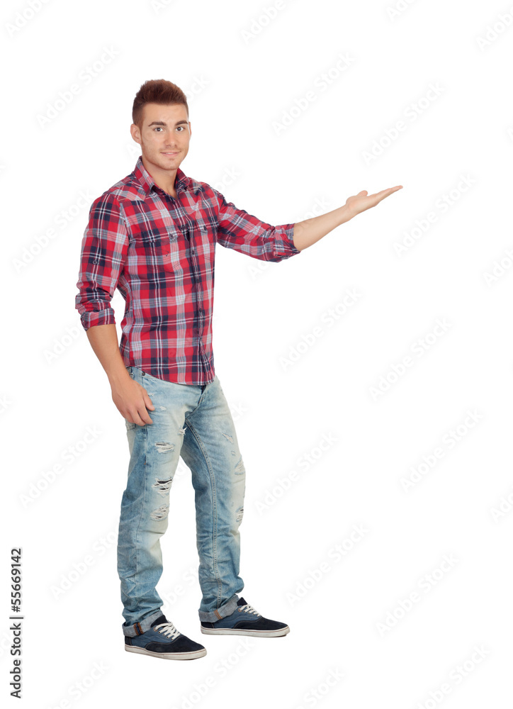 Young smiling man shows something