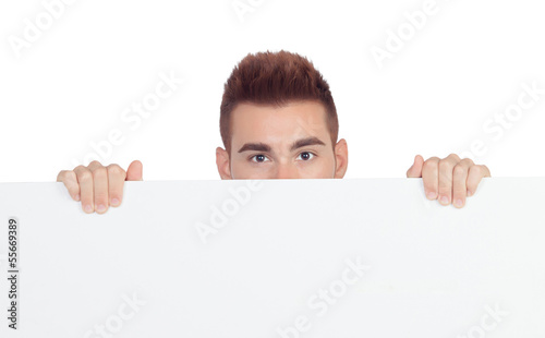 Attractive young man with a blank placard