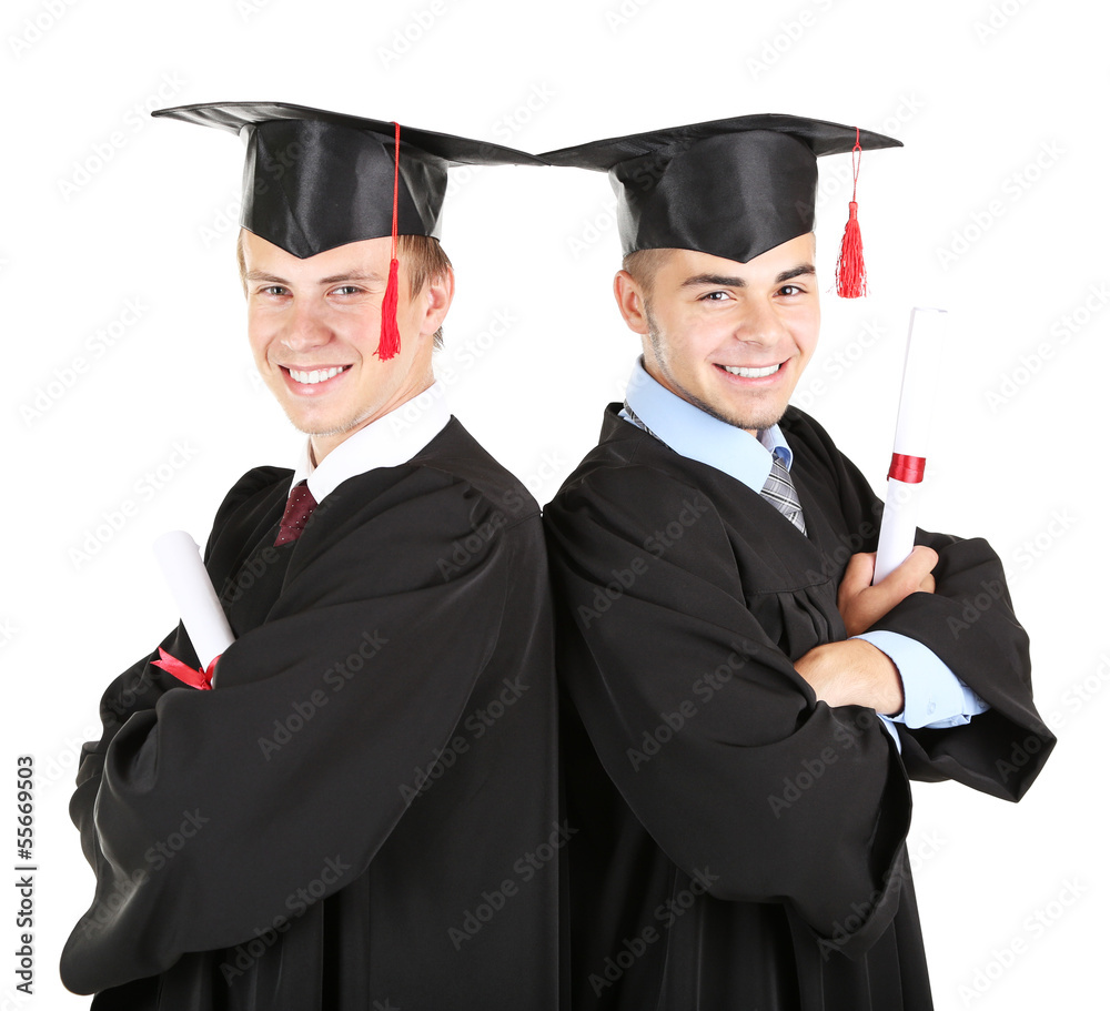 Two happy graduating students isolated on white Two happy graduating students isolated on white