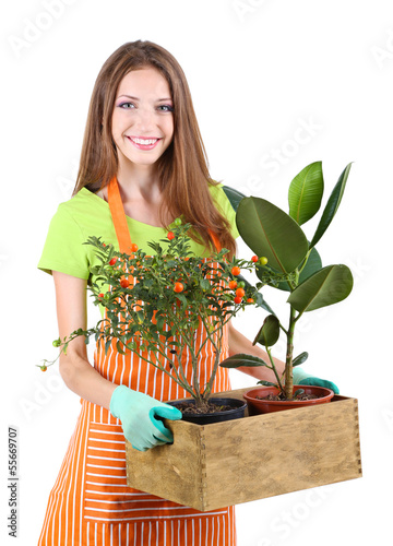 Beautiful girl gardener with flower isolated on white