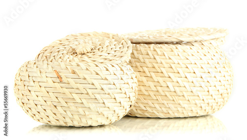 Two wicker baskets with covers, isolated on white