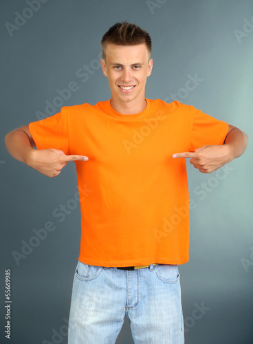 T-shirt on young man, on gr...