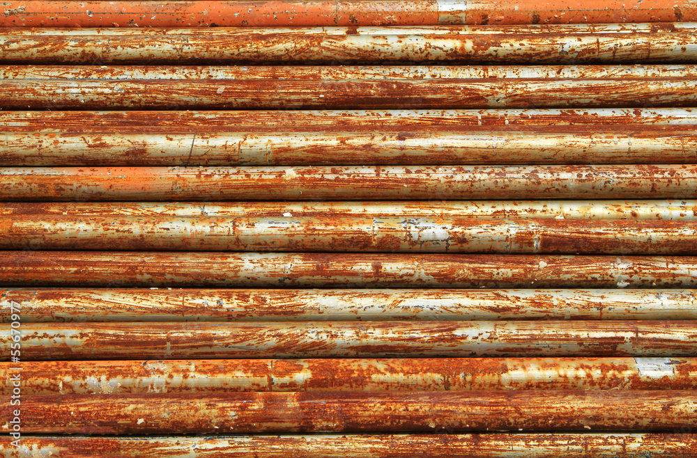 Stack of rusty metal pipes