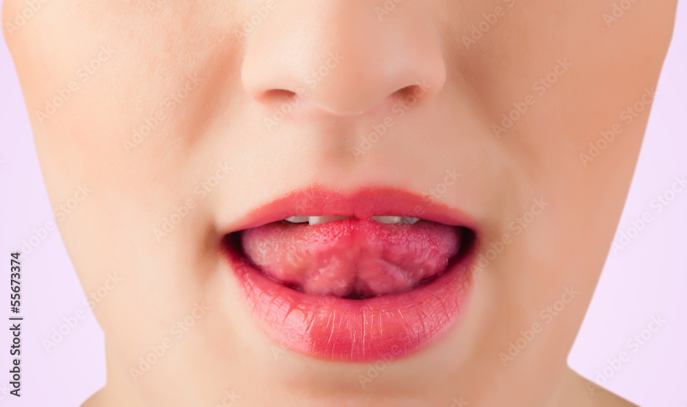 Fototapeta premium Beautiful woman red lips close up