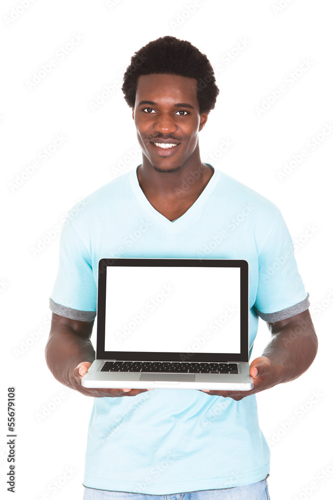 Young Man Using Laptop Young Man Using Laptop