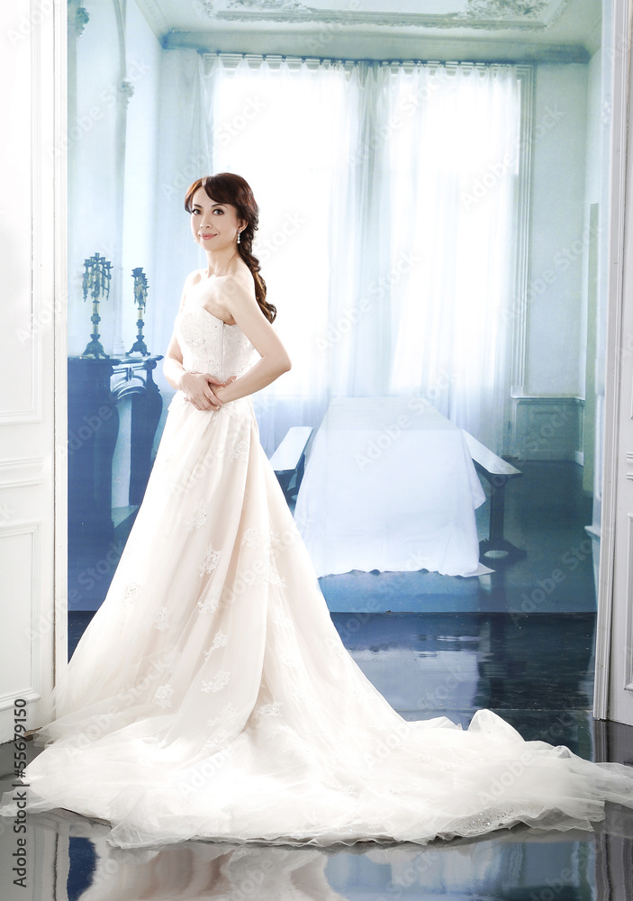 full-length young and beautiful bridge in dress in studio full-length young and beautiful bridge in dress in studio