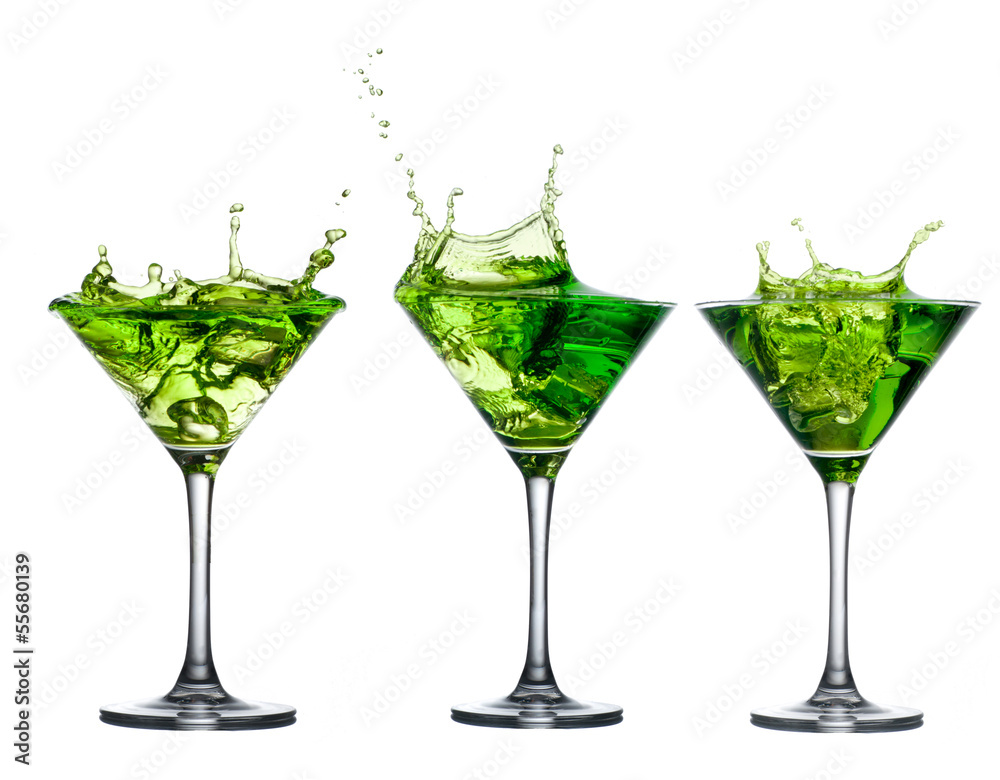 Green alcohol cocktail set with splash on white Green alcohol cocktail set with splash on white