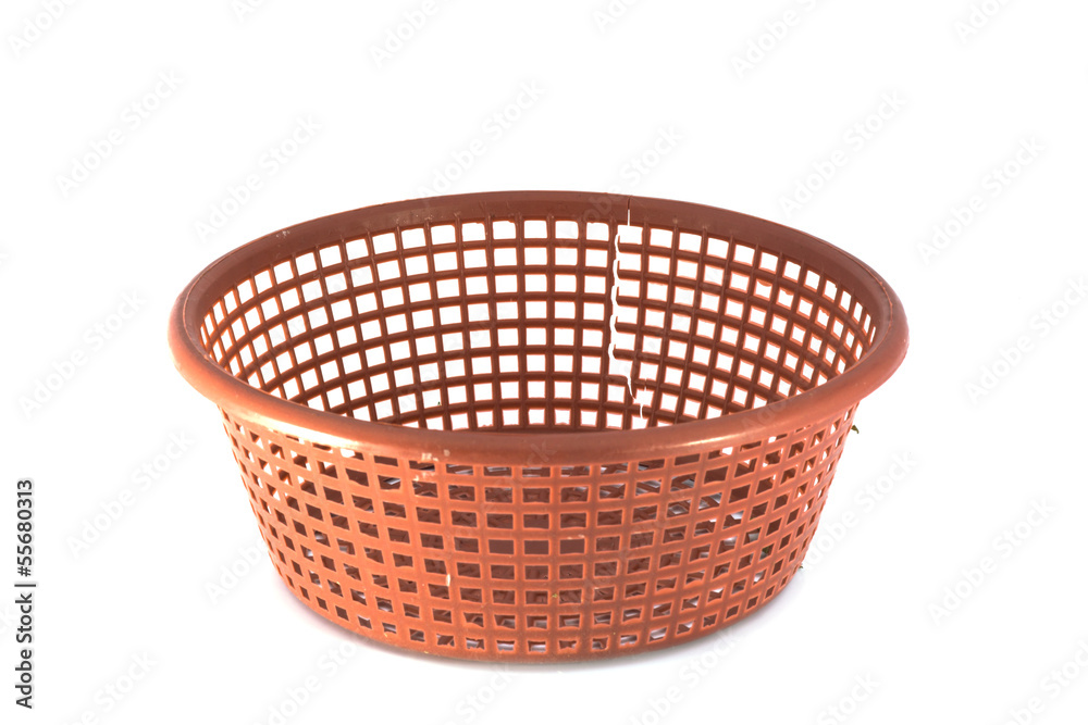 Empty red basket plastic isolated on white Empty red basket plastic isolated on white