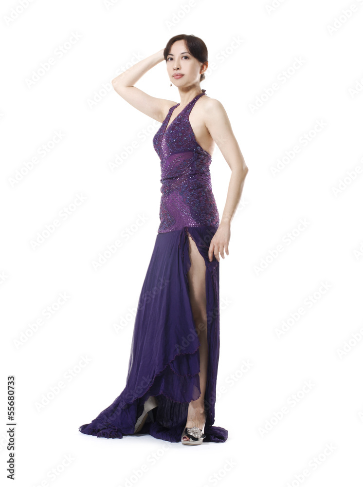 full-length attractive woman posing in evening dress