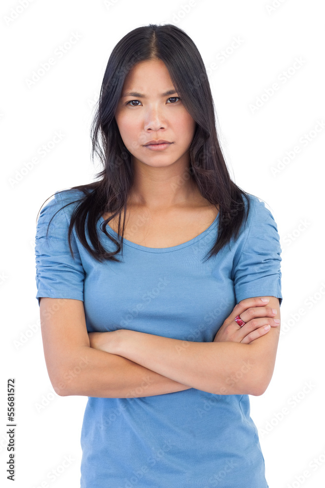 Annoyed asian woman with arms crossed Annoyed asian woman with arms crossed