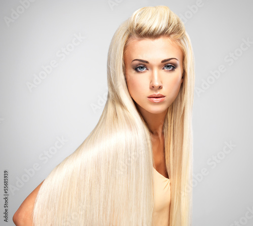 Blond woman with long straight hairs