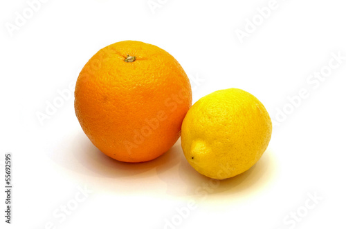 Orange and lemon on white background