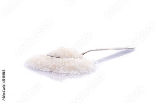 granulated sugar in a spoon