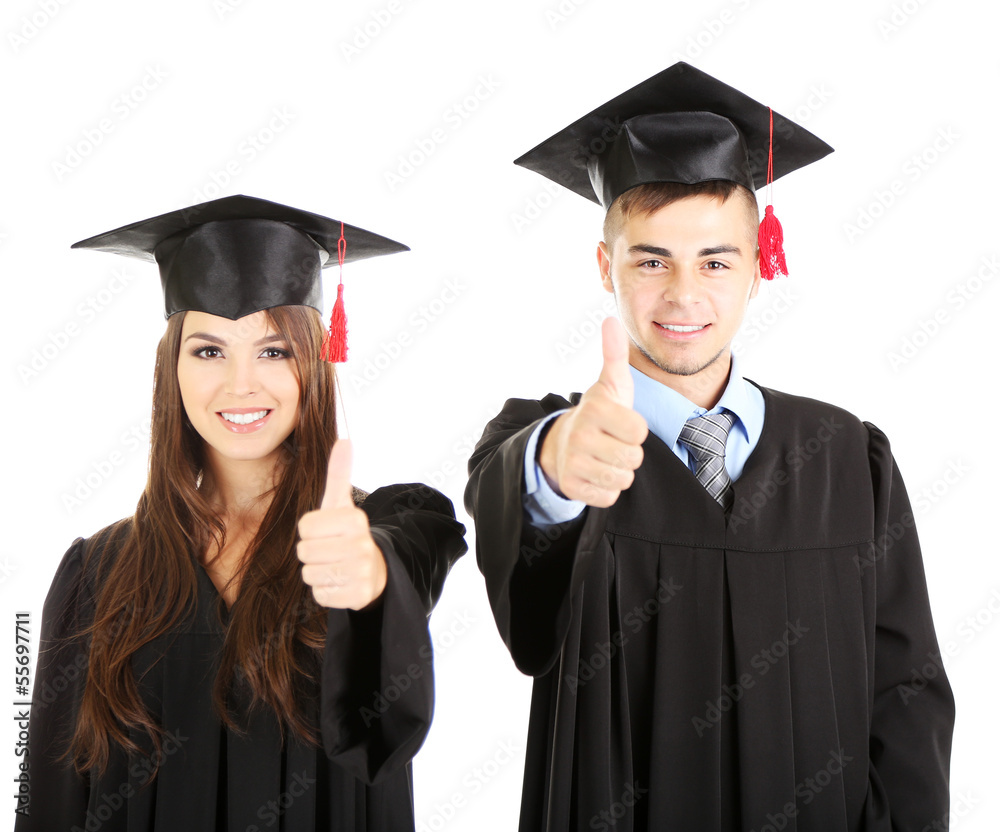 Two happy graduating students isolated on white Two happy graduating students isolated on white