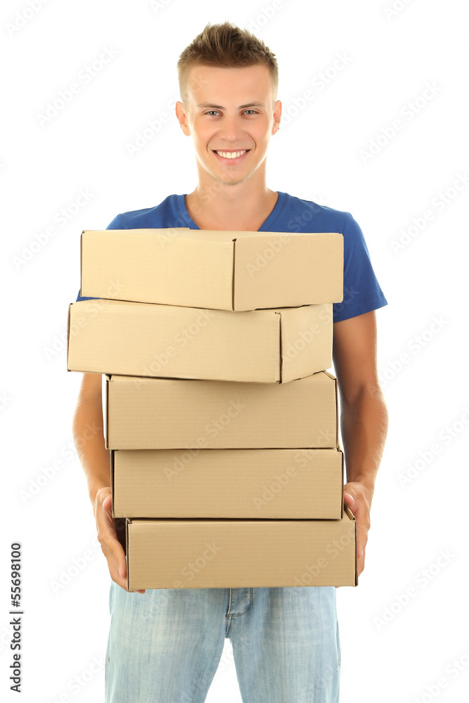 Young delivery man holding parcels, isolated on white Young delivery man holding parcels, isolated on white