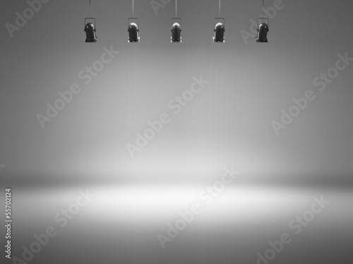 grey spotlight background with lamps photo