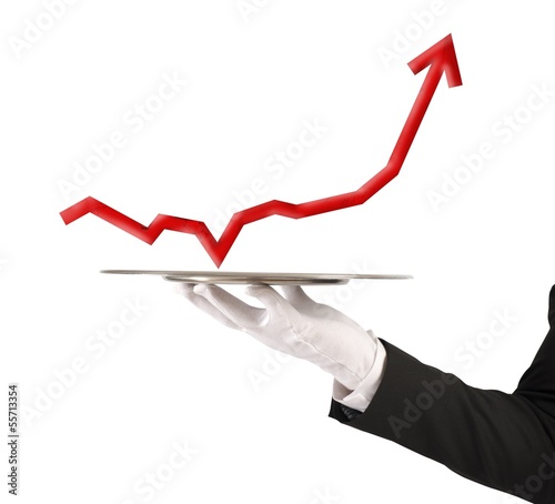 Businessman holds a tray with statistics