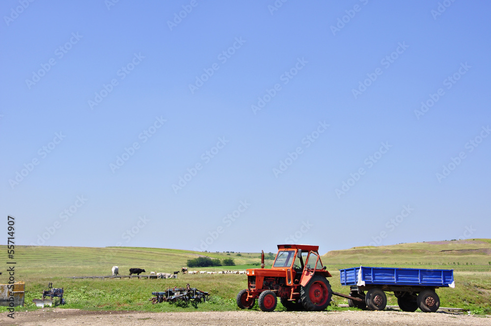 Obraz premium rural landscape with tractor