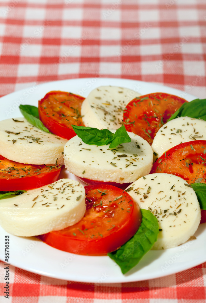 Italian cuisine - salad capreze Italian cuisine - salad capreze