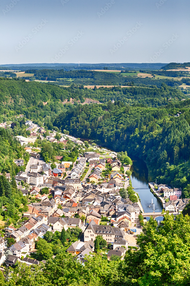 The city of Vianden with river Our and hill tops