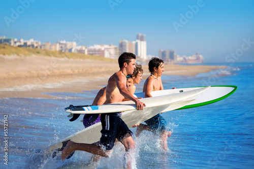 Photography Boys surfers surfing running jumping on surfboards
