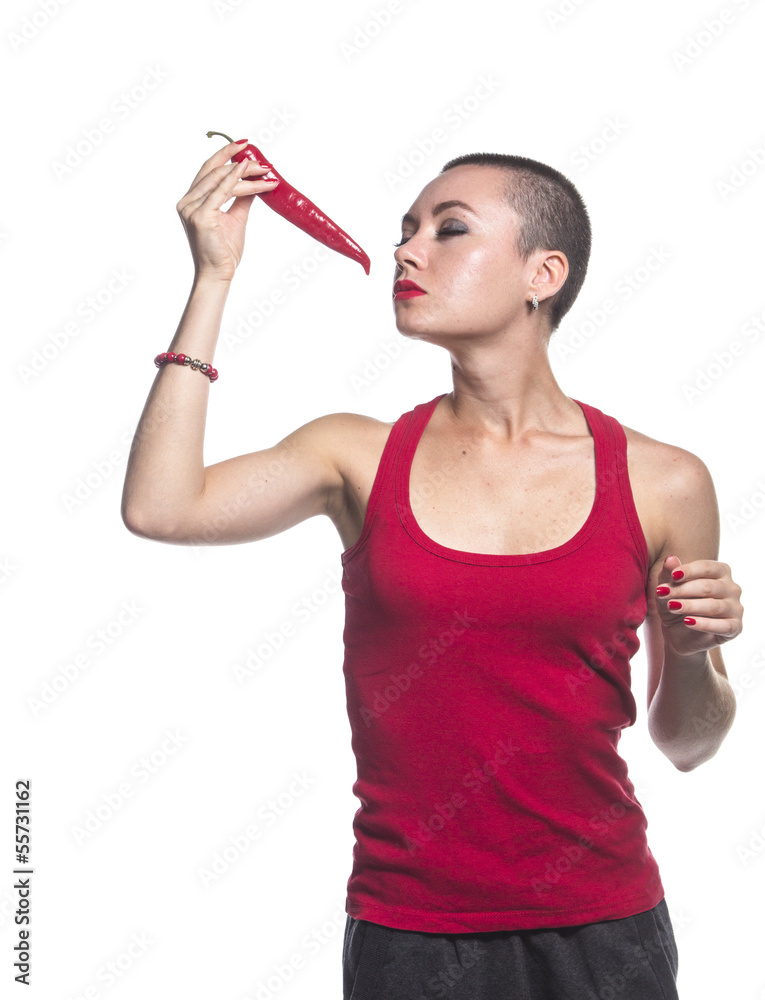 Woman with chili pepper on white background Woman with chili pepper on white background