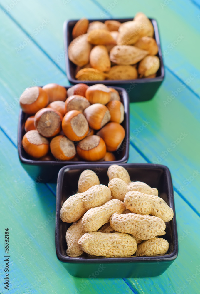 nuts in black bowls nuts in black bowls