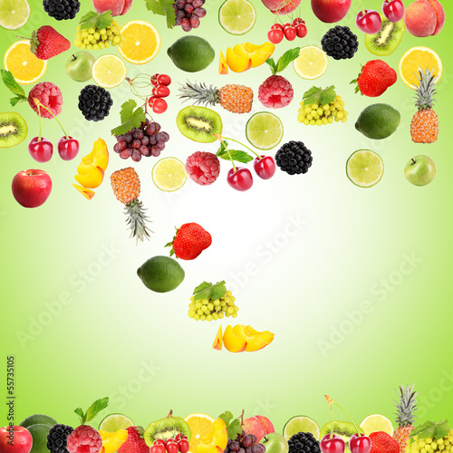 Fototapeta Naklejka Na Ścianę i Meble -  Flight fruit and berries on green background