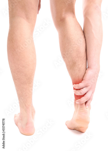 Young man with leg pain, isolated on white