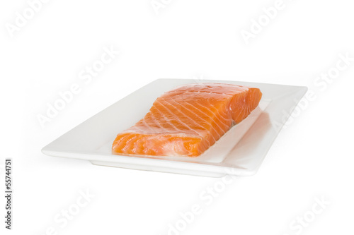 salmon fish on dish with white background