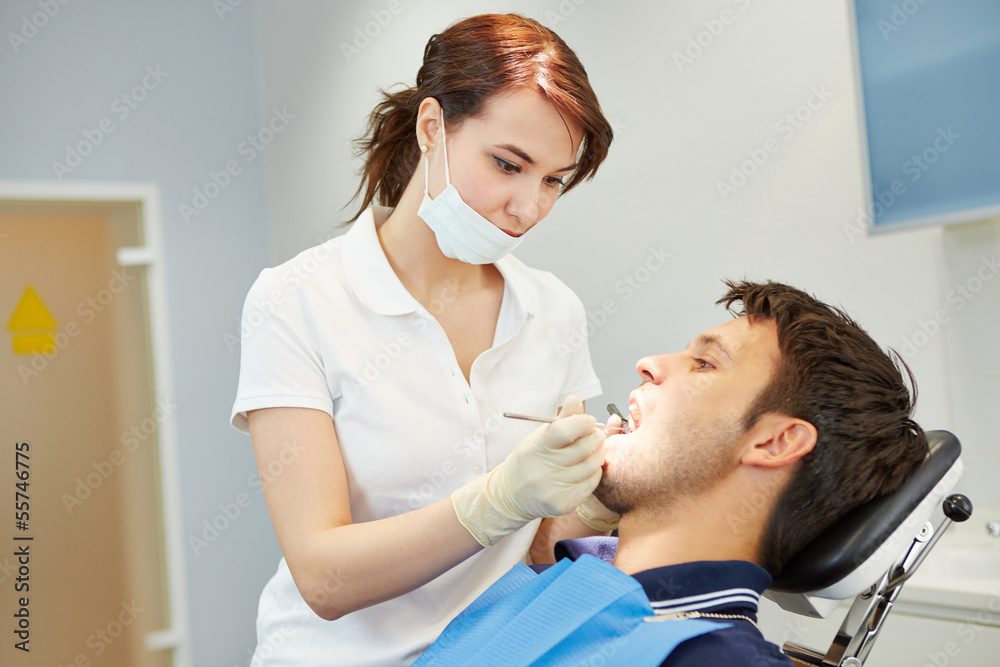 Man with toothache at dentist Man with toothache at dentist