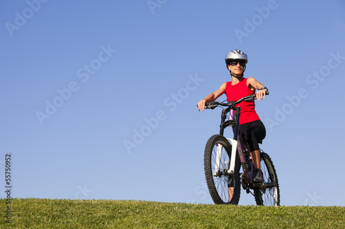 woman having fun on a bicycle
