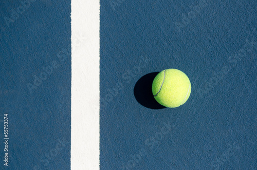 Tennis Ball on Tennis Court © sharpshutter22