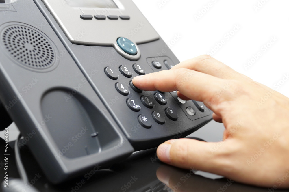 businessman is dialing phone number businessman is dialing phone number