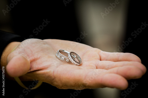 Wedding Rings in Groomsmen Hand