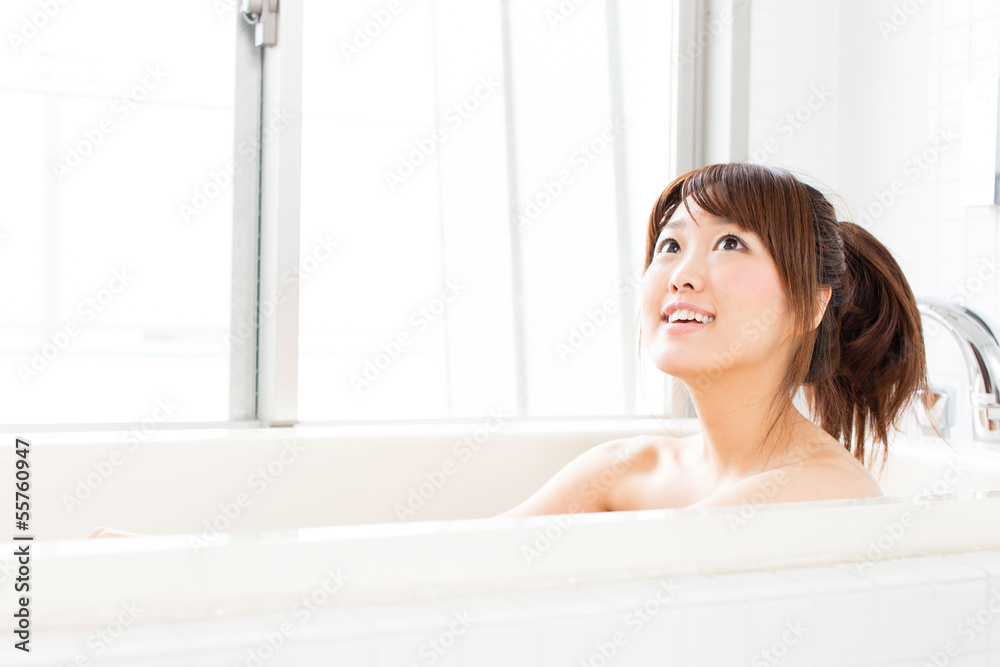 beautiful asian woman relaxing in the bath room beautiful asian woman relaxing in the bath room