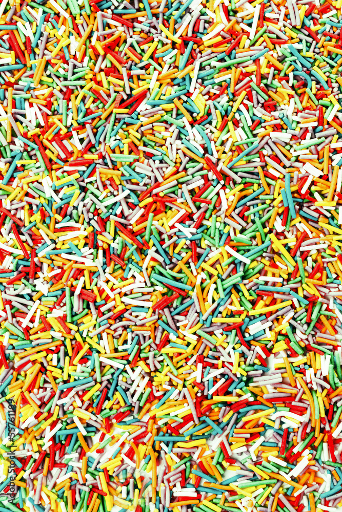 Fototapeta premium Photo colorful neon sprinkles candies for background use, top v