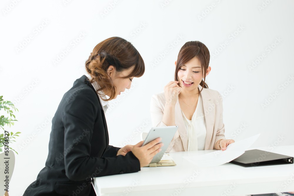 Beautiful young businesswomen working in the office Beautiful young businesswomen working in the office