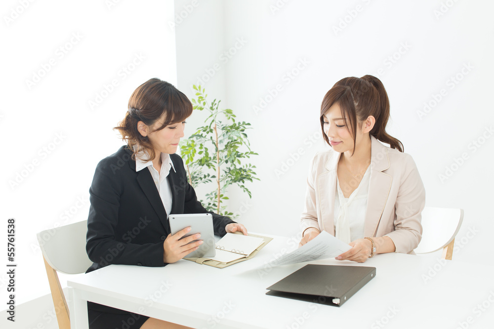 Beautiful young businesswomen working in the office Beautiful young businesswomen working in the office