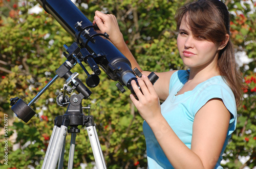 Teen girl and telescope, Near Kiev,Ukraine