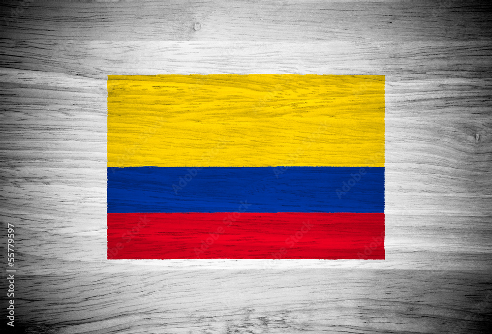 Colombia flag on wood texture