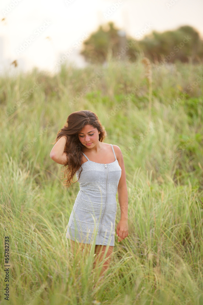 Beautiful woman posing in the dunes Beautiful woman posing in the dunes