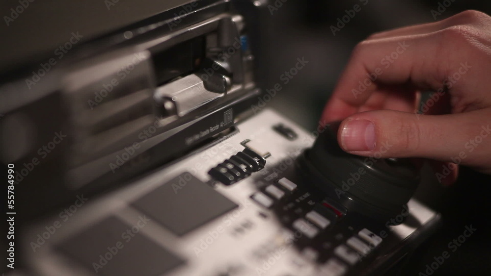 man hand on professional VCR man hand on professional VCR