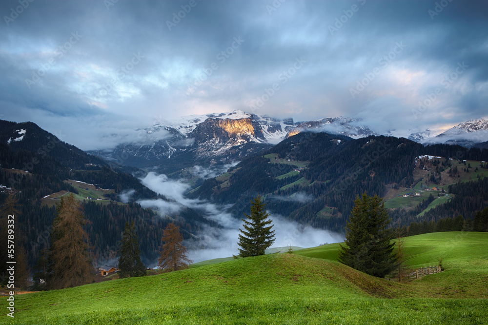 Cloudy sunrise over Dolomite mountains