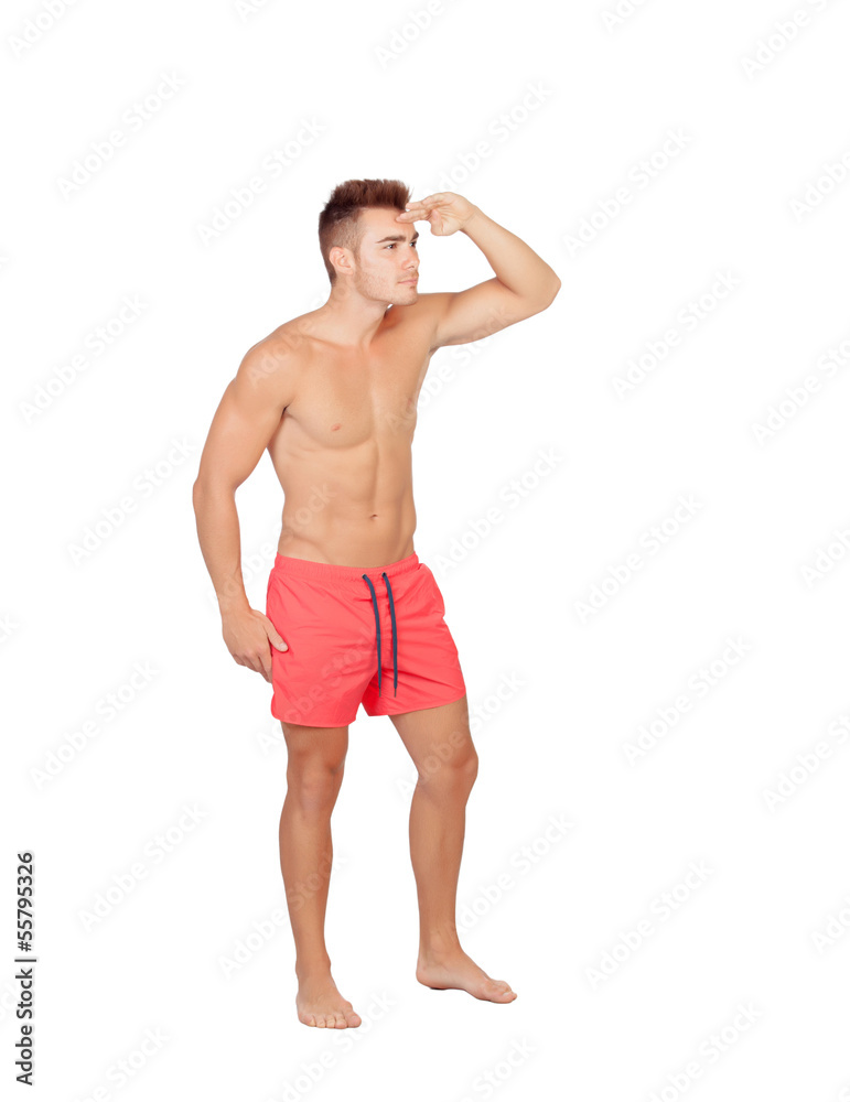 Handsome lifeguard with red swimsuit