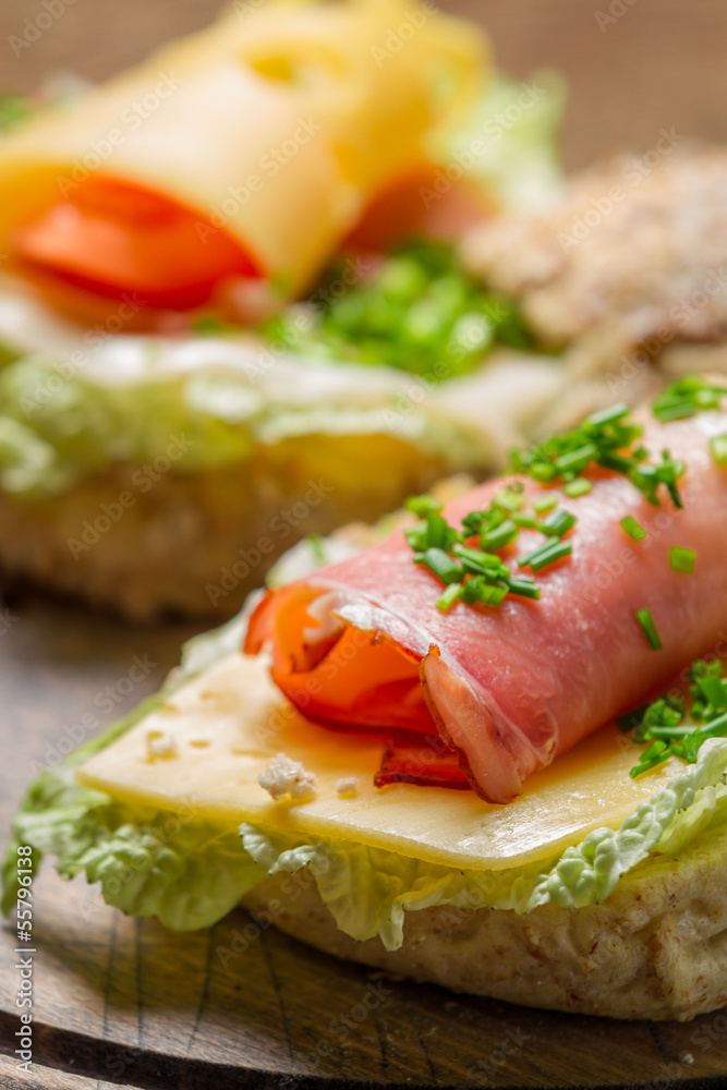 Fresh sandwich made of chive, ham lettuce and cheese Fresh sandwich made of chive, ham lettuce and cheese