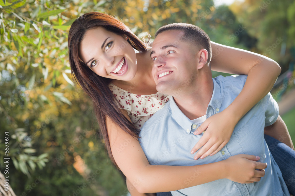 Fototapeta premium Mixed Race Romantic Couple Portrait in the Park
