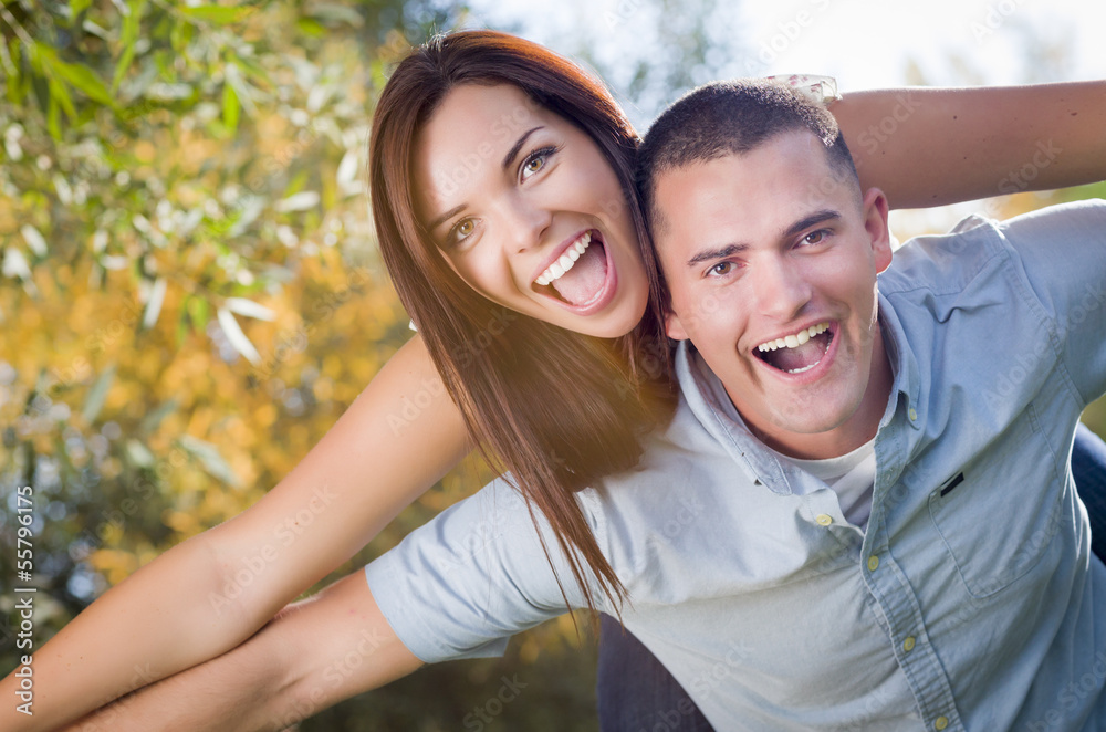 Fototapeta premium Mixed Race Romantic Couple Portrait in the Park