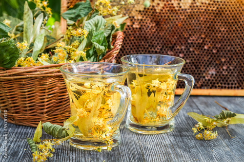 Summer lime tea with honey served in the garden